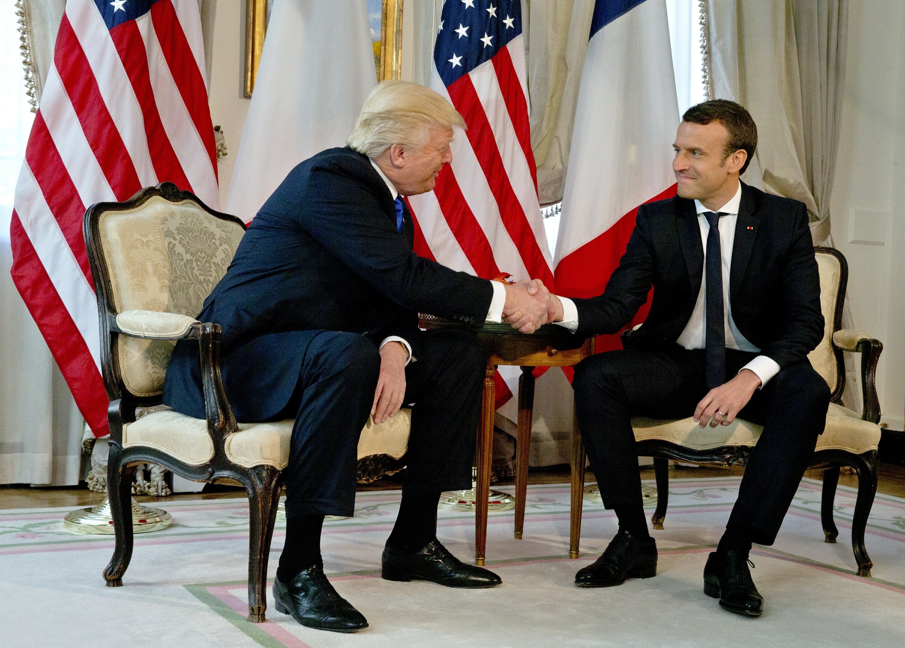 Internet Divided Over Trump S Handshake With France S